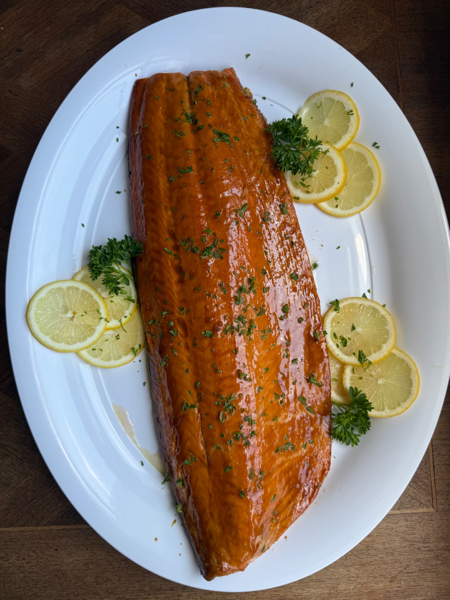 Catered whole salmon with lemon and herbs